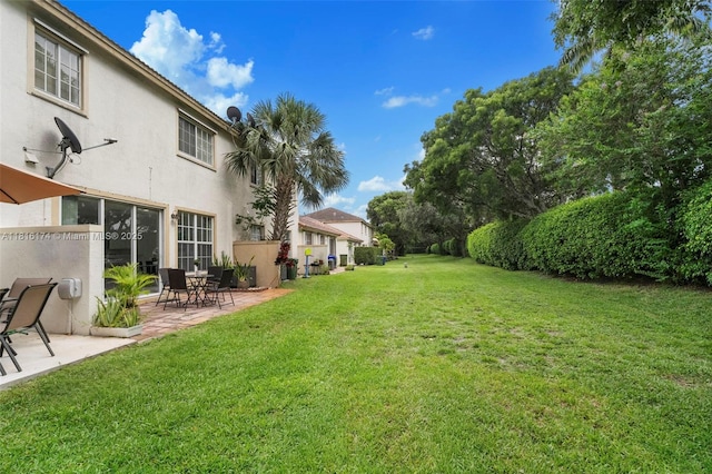1968 NW 79th Way, Pembroke Pines, FL 33024 - view of grassy yard with a patio area