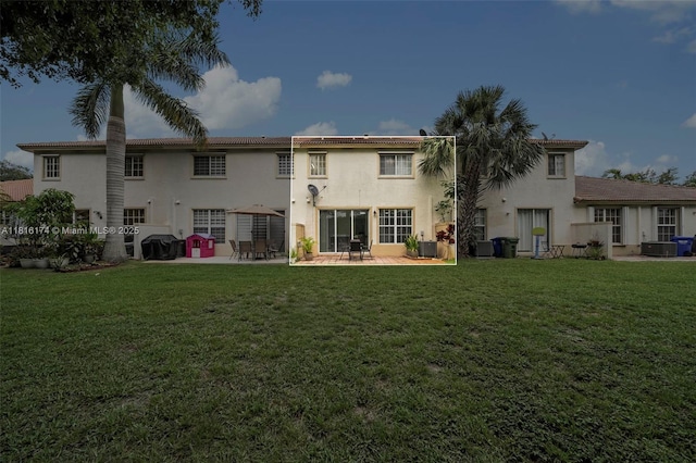 1968 NW 79th Way, Pembroke Pines, FL 33024 - rear view of property featuring a patio, stucco siding, and a lawn
