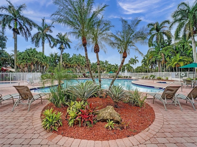 1968 NW 79th Way, Pembroke Pines, FL 33024 - community pool featuring a patio