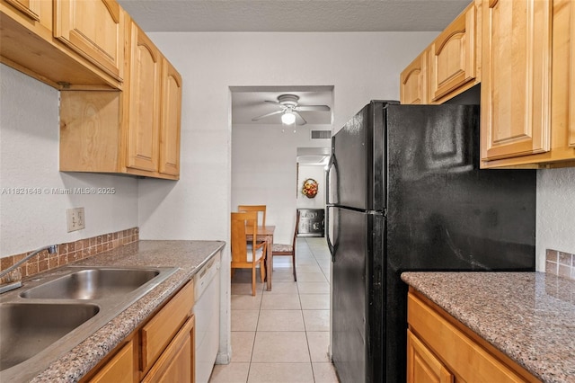 200 Croton Ave Unit 102, Lantana, FL 33462 - kitchen with dishwasher, freestanding refrigerator, a ceiling fan, light tile patterned flooring, and light brown cabinets