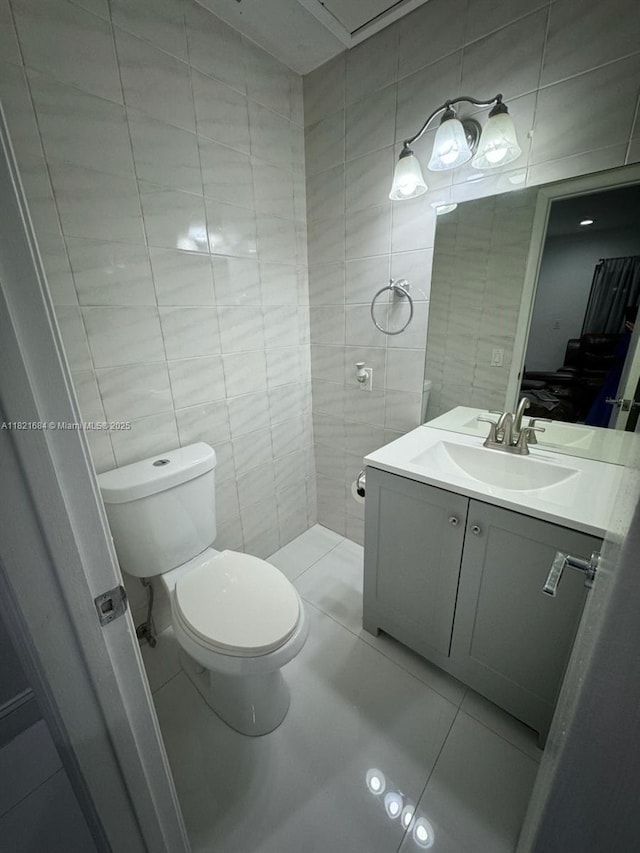 6315 SW 138th Ct Unit 6315-4, Miami, FL 33183 - half bathroom with vanity, tile walls, and tile patterned floors