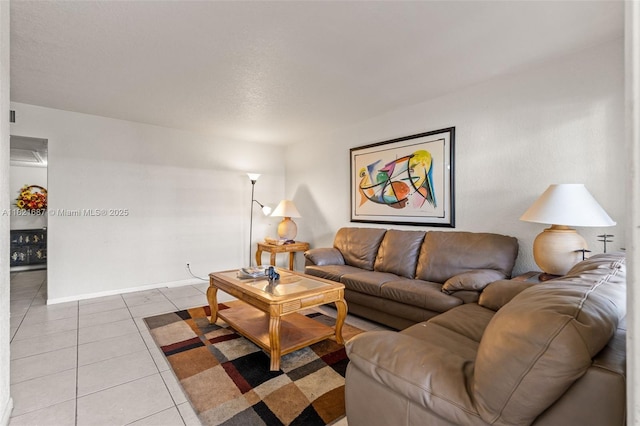 220 Croton Ave Unit 102, Lantana, FL 33462 - tiled living room featuring baseboards