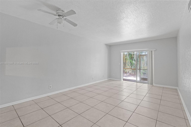 220 Croton Ave Unit 102, Lantana, FL 33462 - empty room featuring a textured ceiling, ceiling fan, and light tile patterned flooring