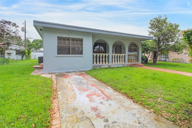 5959 SW 16th Ter, West Miami, FL 33155 - view of front of home featuring a porch and stucco siding