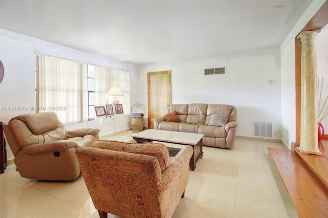 5959 SW 16th Ter, West Miami, FL 33155 - living room with decorative columns and light tile patterned flooring