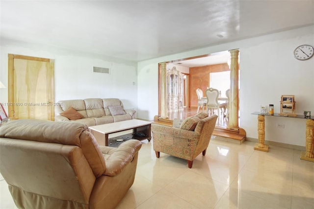 5959 SW 16th Ter, West Miami, FL 33155 - living area featuring ornate columns and light tile patterned flooring