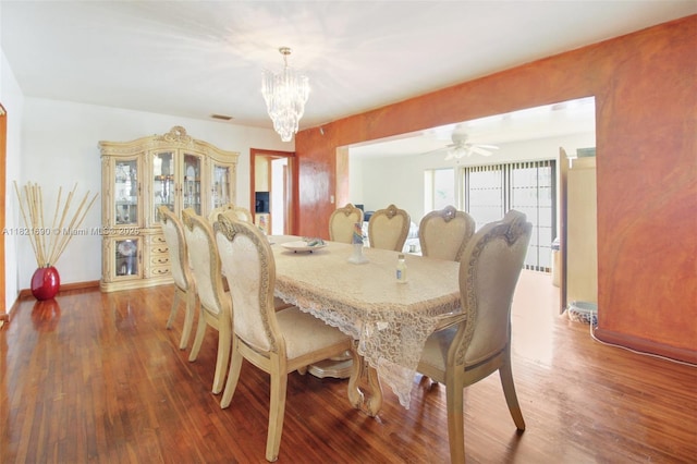 5959 SW 16th Ter, West Miami, FL 33155 - dining area with wood finished floors and a chandelier