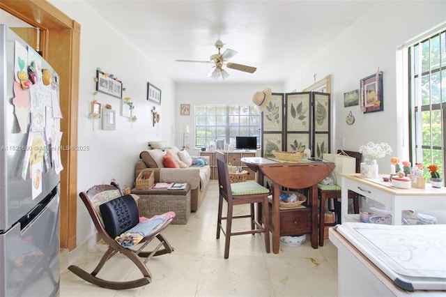5959 SW 16th Ter, West Miami, FL 33155 - dining space with a ceiling fan and plenty of natural light