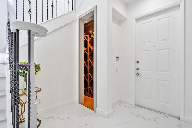 1382 Harbor Vw W, Hollywood, FL 33019 - entryway featuring marble look tiles and baseboards