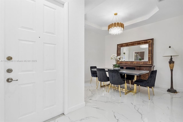 1382 Harbor Vw W, Hollywood, FL 33019 - dining area with light marble finish floors, a chandelier, and a tray ceiling