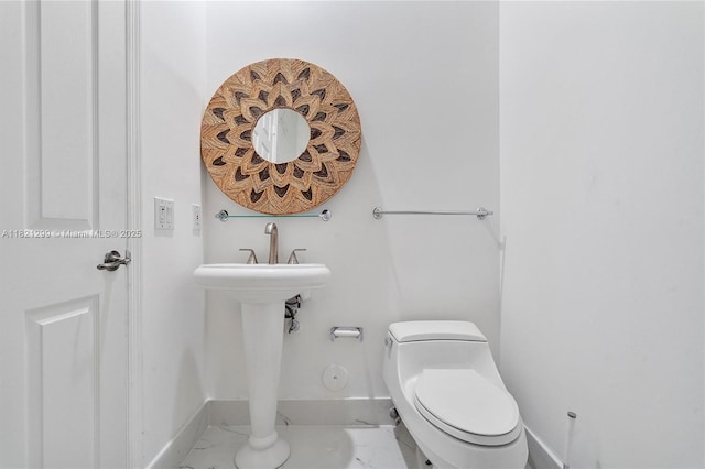 1382 Harbor Vw W, Hollywood, FL 33019 - bathroom featuring toilet and marble finish flooring