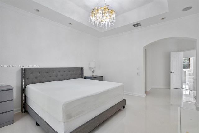 1382 Harbor Vw W, Hollywood, FL 33019 - bedroom with arched walkways, ornamental molding, light tile patterned floors, a chandelier, and a tray ceiling
