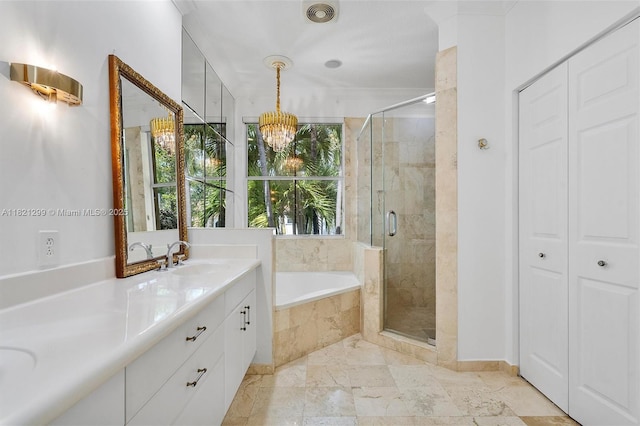 1382 Harbor Vw W, Hollywood, FL 33019 - bathroom with a bath, a chandelier, a shower stall, double vanity, and a closet