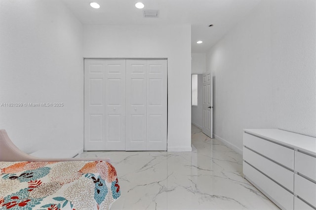 1382 Harbor Vw W, Hollywood, FL 33019 - bedroom featuring light marble finish flooring, recessed lighting, and a closet