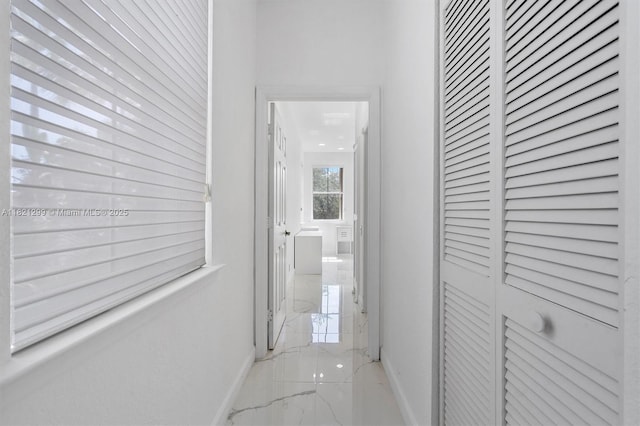 1382 Harbor Vw W, Hollywood, FL 33019 - hallway featuring light marble finish floors and baseboards