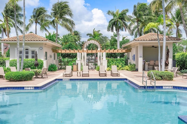 1382 Harbor Vw W, Hollywood, FL 33019 - community pool featuring a ceiling fan, a patio area, an outdoor structure, and an exterior structure