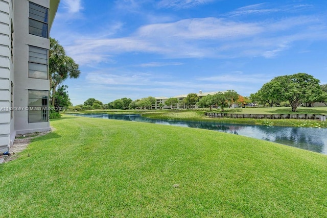1520 Whitehall Dr Unit 103, Davie, FL 33324 - view of grassy yard featuring a water view