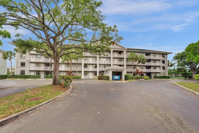 1520 Whitehall Dr Unit 103, Davie, FL 33324 - view of building exterior with uncovered parking