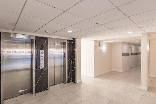 801 NW 47th Ave Unit 409W, Miami, FL 33126 - interior space with elevator, recessed lighting, a drop ceiling, and tile patterned floors