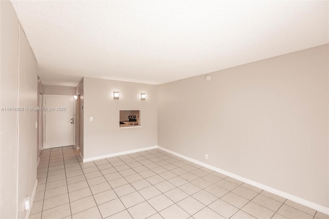 801 NW 47th Ave Unit 409W, Miami, FL 33126 - empty room featuring light tile patterned flooring