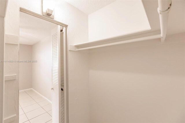 801 NW 47th Ave Unit 409W, Miami, FL 33126 - spacious closet with light tile patterned floors