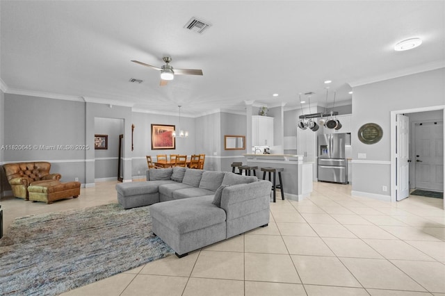 542 Penta Ct, Weston, FL 33327 - living area featuring light tile patterned floors, ceiling fan, crown molding, recessed lighting, and a chandelier