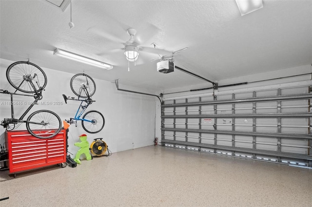 542 Penta Ct, Weston, FL 33327 - garage with a garage door opener and ceiling fan