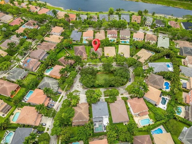 542 Penta Ct, Weston, FL 33327 - aerial view of property and surrounding area featuring nearby suburban area and a large body of water