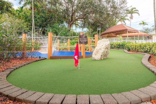 542 Penta Ct, Weston, FL 33327 - view of playground featuring an area to practice putting and a gazebo