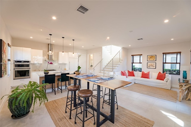 8217 NW 46th St, Doral, FL 33166 - dining room with recessed lighting and stairway