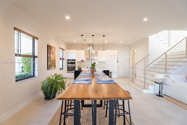 8217 NW 46th St, Doral, FL 33166 - dining space featuring stairway, recessed lighting, and light tile patterned flooring