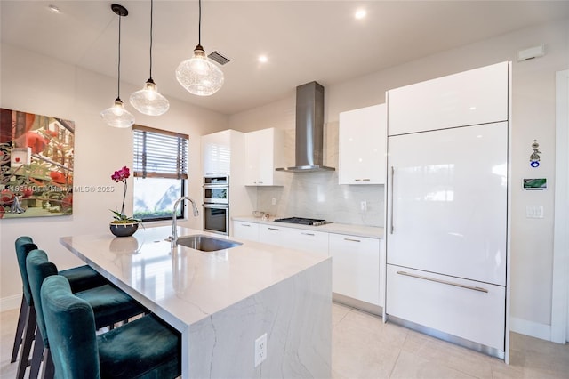 8217 NW 46th St, Doral, FL 33166 - kitchen featuring wall chimney range hood, double oven, paneled built in refrigerator, and modern cabinets