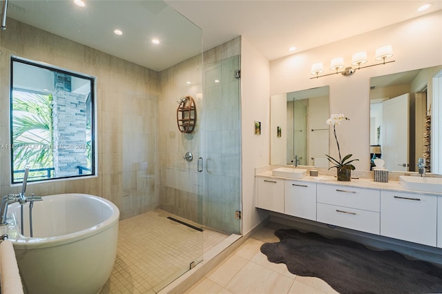 8217 NW 46th St, Doral, FL 33166 - full bath with tile patterned floors, a stall shower, a soaking tub, double vanity, and recessed lighting