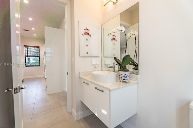 8217 NW 46th St, Doral, FL 33166 - bathroom featuring vanity, tile patterned flooring, and recessed lighting