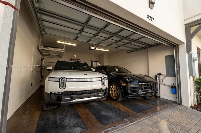 8217 NW 46th St, Doral, FL 33166 - garage featuring a garage door opener and electric panel
