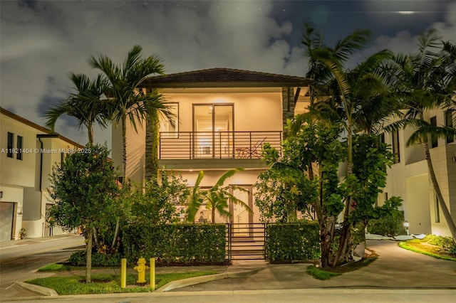8217 NW 46th St, Doral, FL 33166 - view of front of home featuring a balcony and stucco siding