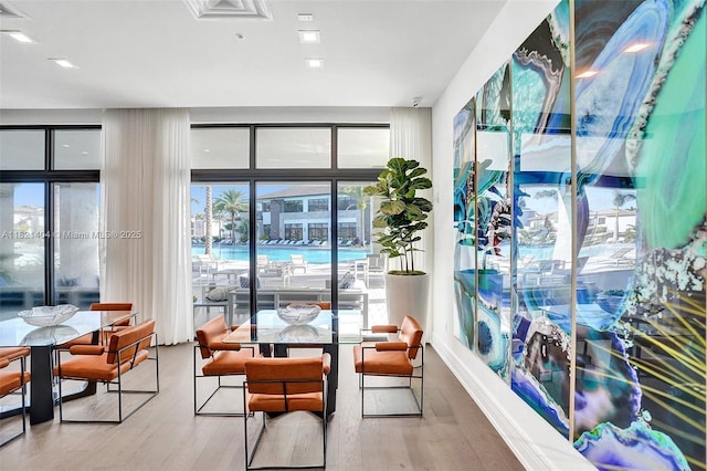 8217 NW 46th St, Doral, FL 33166 - dining space featuring light wood-style floors