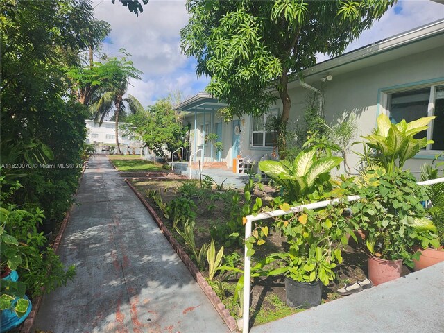 1239 Marseille Dr Unit 4, Miami Beach, FL 33141 - view of front of home with stucco siding