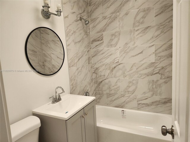 1239 Marseille Dr Unit 4, Miami Beach, FL 33141 - bathroom featuring vanity and shower / washtub combination