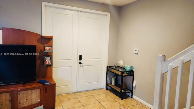 2190 SE 2nd St, Homestead, FL 33033 - foyer with light tile patterned floors and baseboards