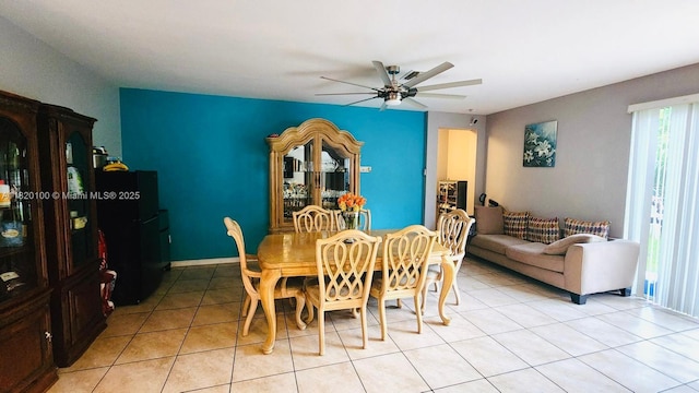 2190 SE 2nd St, Homestead, FL 33033 - dining area with ceiling fan and light tile patterned floors