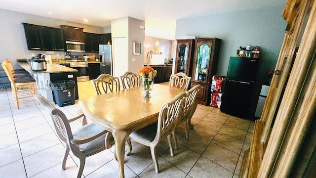 2190 SE 2nd St, Homestead, FL 33033 - dining room with light tile patterned flooring