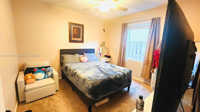 2190 SE 2nd St, Homestead, FL 33033 - carpeted bedroom with baseboards and a ceiling fan