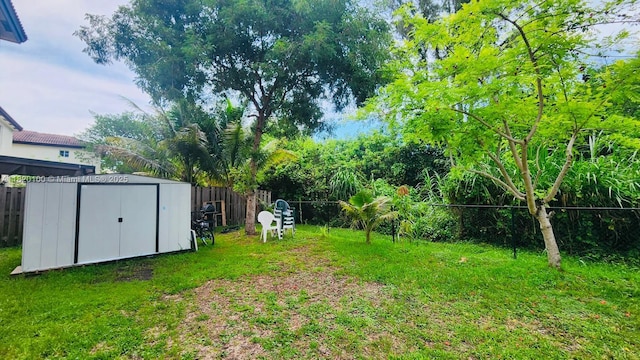 2190 SE 2nd St, Homestead, FL 33033 - fenced backyard featuring a storage unit