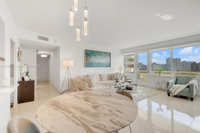3200 NE 36th St Unit 1221, Fort Lauderdale, FL 33308 - living area featuring light tile patterned floors and a skyline view