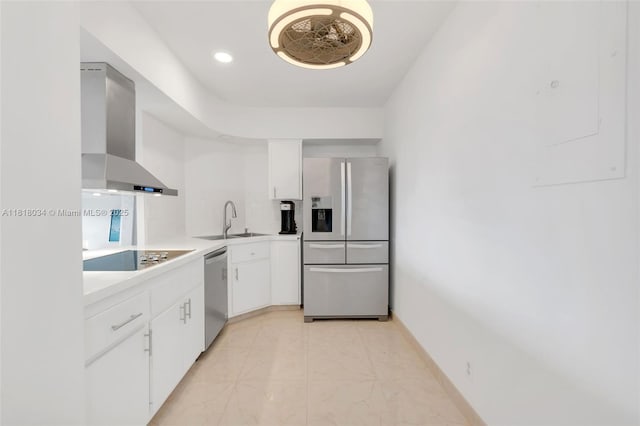 3200 NE 36th St Unit 1221, Fort Lauderdale, FL 33308 - kitchen with appliances with stainless steel finishes, wall chimney range hood, white cabinets, and light countertops