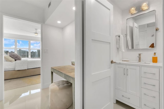 3200 NE 36th St Unit 1221, Fort Lauderdale, FL 33308 - ensuite bathroom featuring vanity, ceiling fan, recessed lighting, and tile patterned flooring