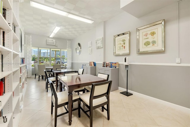 3200 NE 36th St Unit 1221, Fort Lauderdale, FL 33308 - dining space featuring a wall unit AC and light tile patterned flooring