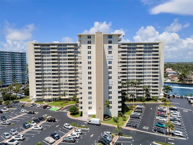3200 NE 36th St Unit 1221, Fort Lauderdale, FL 33308 - view of apartment building / complex with uncovered parking and a water view
