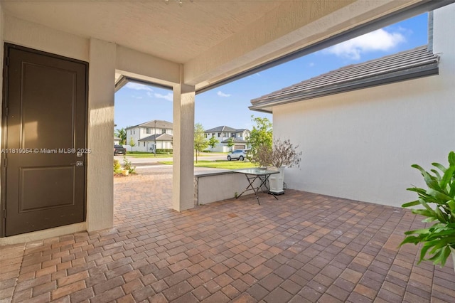 13005 Addilyn Ct, Davie, FL 33325 - view of patio featuring a residential view